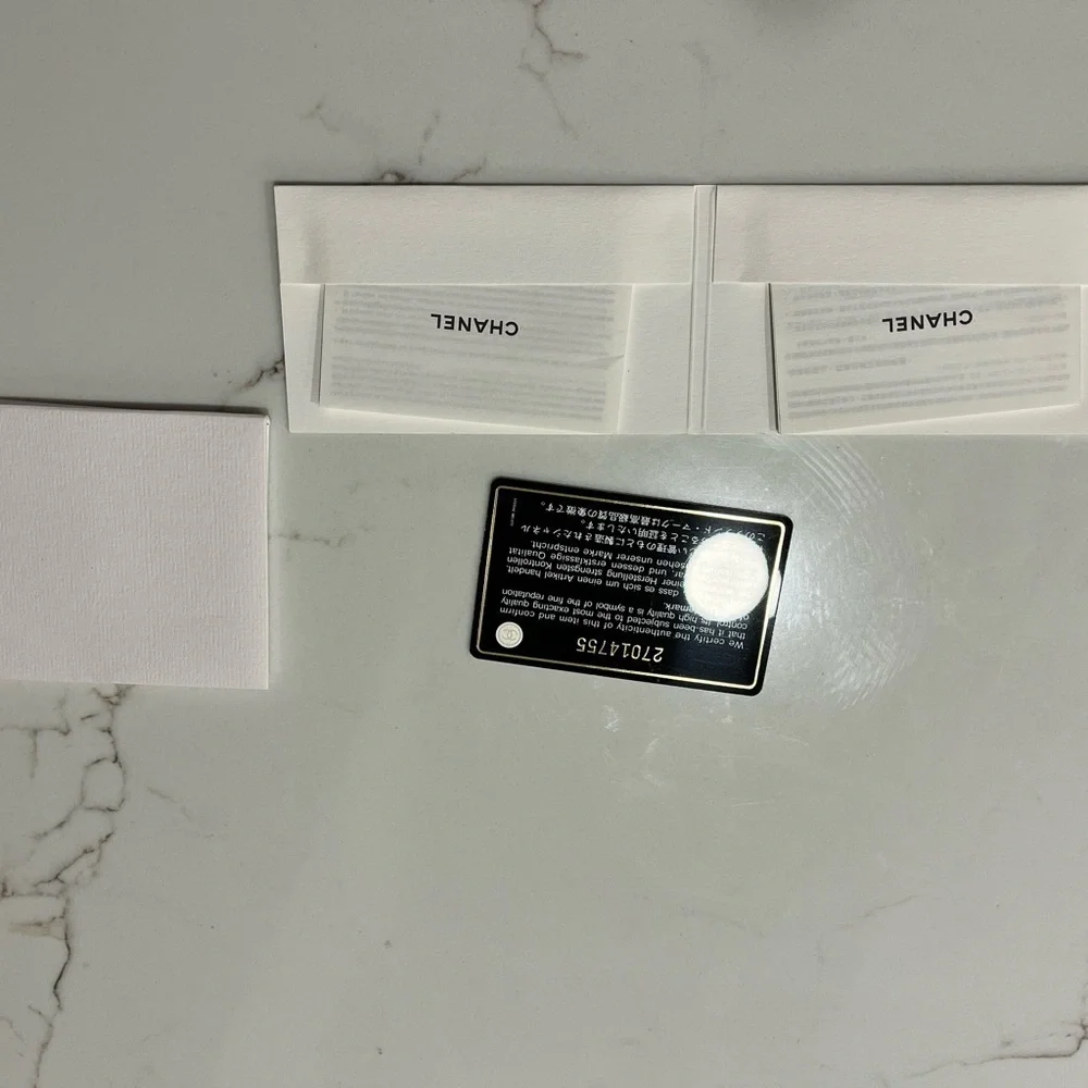 Chanel Zippy linen wallet
